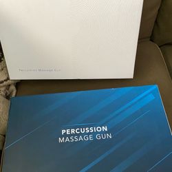 Two brand new handheld Massage Guns