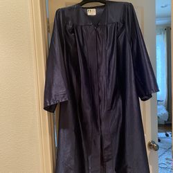 Blue Graduation Cap And Gown