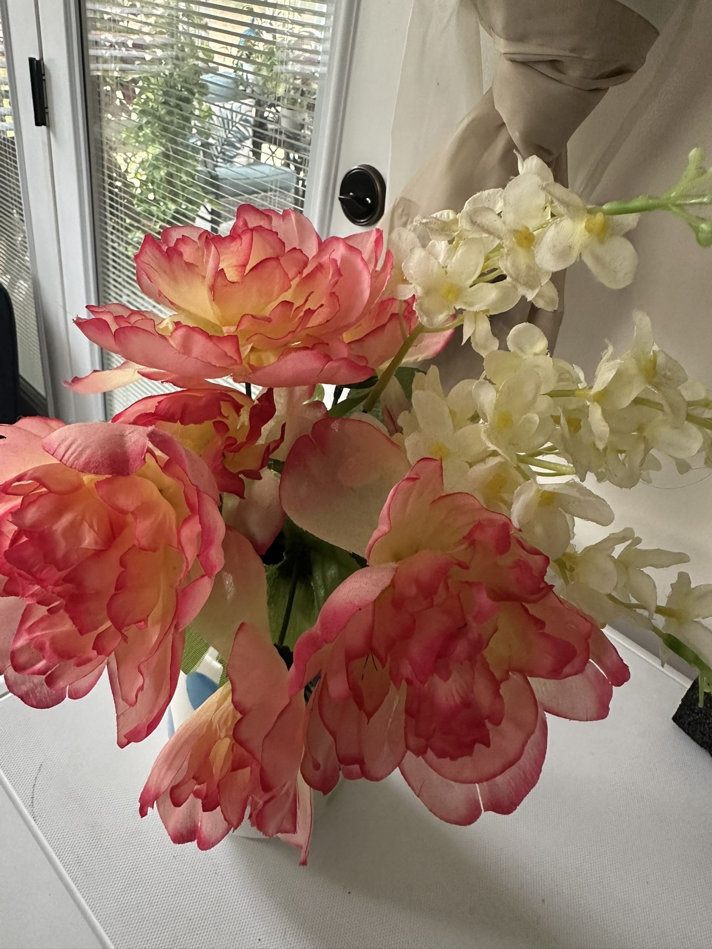 Vase with the flowers