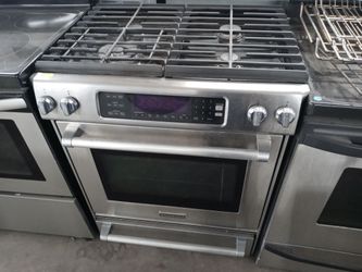 KitchenAid stainless steel 4-burner dual-fuel slide-in range - Free delivery
