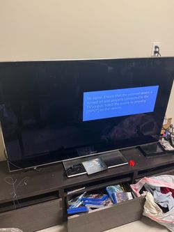 Panasonic flat-screen TV, a Panasonic 3D Full HD Blu-ray player