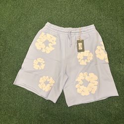 Baby blue denim tears shorts