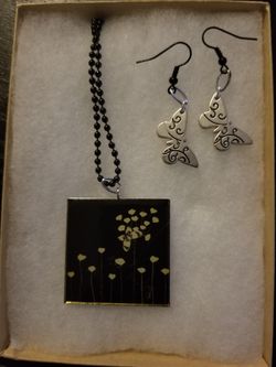 Hand crafted black necklace with matching earrings.