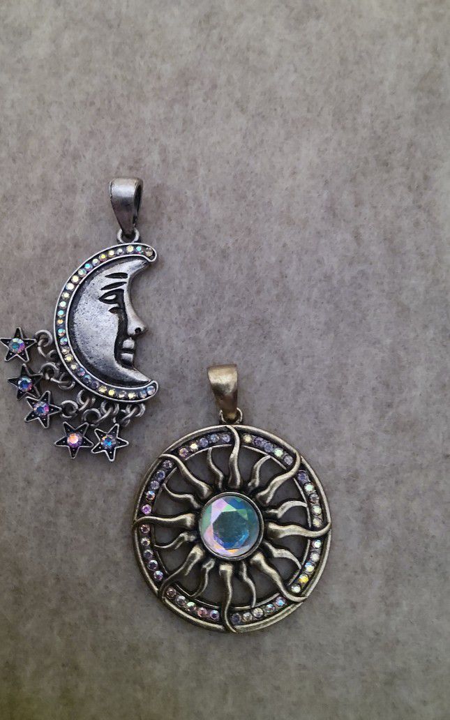 Two Detailed Pendants  A Sun And  Moon