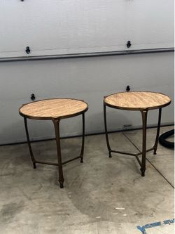 2 gold and stone tables