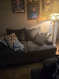 Sofa and 2 loveseats. Bought about 2 1/2 years ago at Gallery Furniture. Very dark gray almost black.