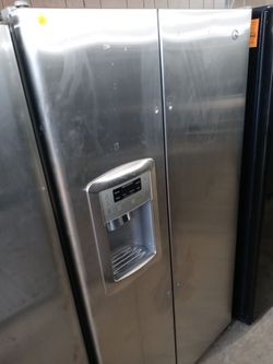 GE stainless steel side by side refrigerator (no handles) - Free delivery