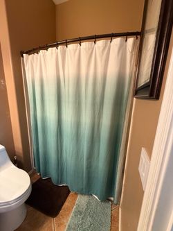 Oil rubbed bronze shower rod