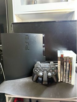 Play station 3  slim + charging set.