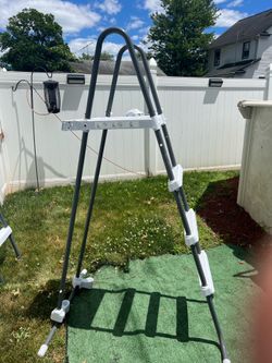 Swimming pool ladder above ground