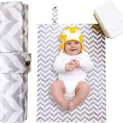 Portable diaper changing pad