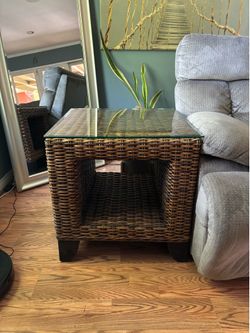2 Brown woven end tables