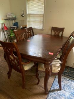 Large dining table with 6 chairs