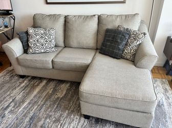 Light Gray Ashley Furniture 92" Sectional Sofa with Reversible Chaise