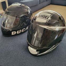 2 Motorcycle Helmets
