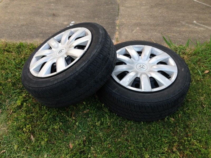 4-'05 steel rims & tires. 3 good tires. $50