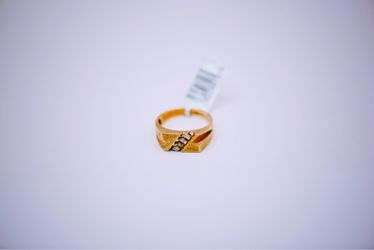 10 K yellow gold ring with four moissanite gems
