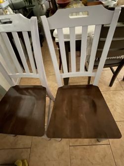 Two wooden strong chairs excellent condition