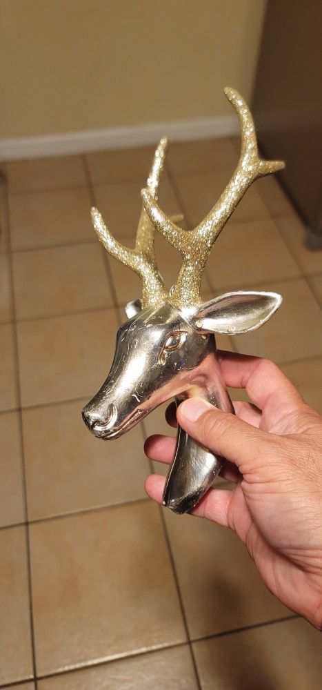 Deer head ornament.