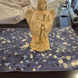 Angel Holding Trumpet 