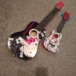 HELLO  KITTY WOOD GUITAR. AN UKALAYLE. BOTH. 100 BUCKS