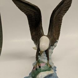 Hand Painted Ceramic Eagle clutching a salmon. 