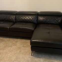 Black Leather L-shaped Sectional Sofa with Adjustable Headrest