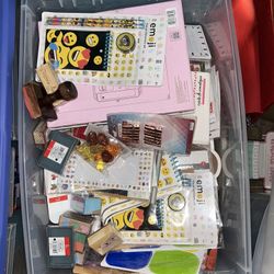 Bin of Stationery (notepads, stamps, folder, stickers, erasers)