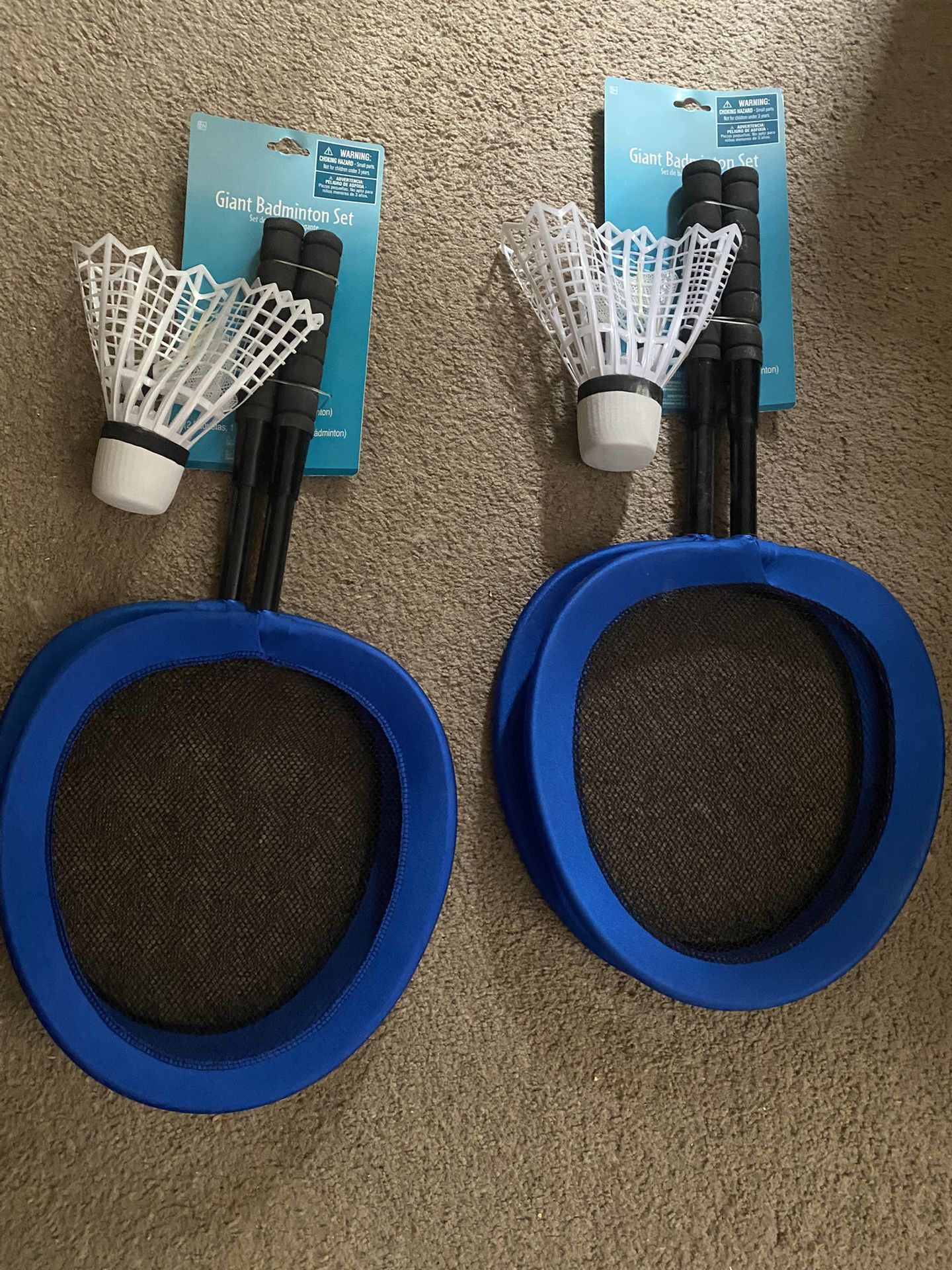 Two sets of badminton rackets with birdies new