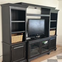 Large black wood entertainment Center