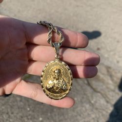 14k Virgin Mary and sacred heart double sided pendant