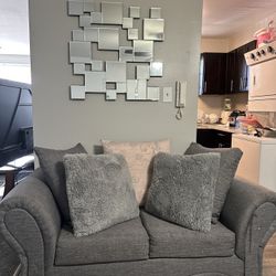 2 pieces of furniture and 2 glass tables