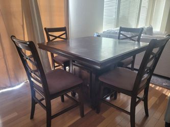 Counter height table and four chairs- Ashley Furniture