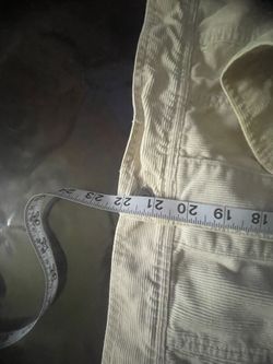 Used Cream color corduroys jacket, and pants with designed down the side of pants