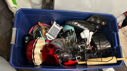 Container lot full of mixed baking stuff and cooking utensils.