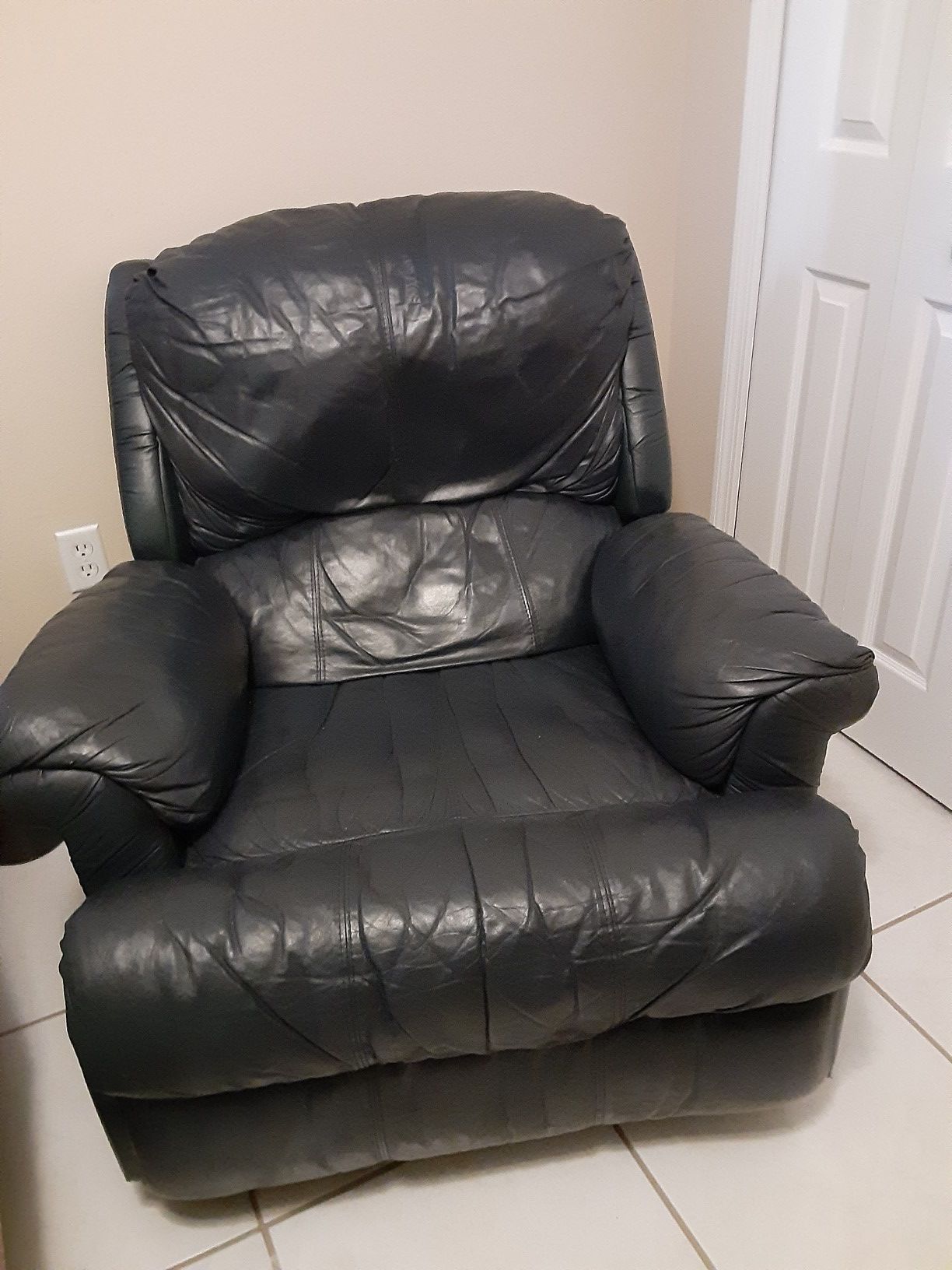 Dark blue recliner. In good shape. $50. OBO