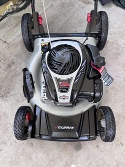FEW TIMES USE SAME DAY AVAILABLE  MURRAY 21 INCH WITHD CUT. PUSH LAWNMOWER . PERFECTLY  WORKING CONDITION POWERED BY SUPER AMERICAN ENGINE BRIGGS AND 