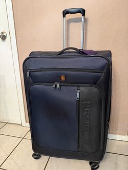SWISSTECH LUGGAGE IN GOOD CONDITION (H 31” x L19” x Deep 13”)