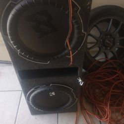 Two Kicker 12s And A Ported Box With Amp