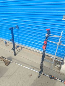 Weed eater 3 tool rack with combo lock,went in enclosed trailer, very clean