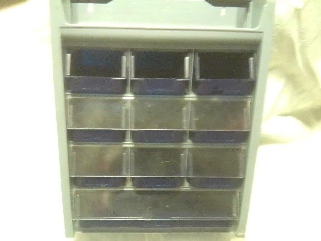 10 Drawer Storage. Portable or can be Put on wall. Dimensions L 14 H 18.5 W 7
