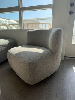 Light grey rotating chair