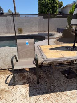 Patio Table with 6 Brand New Chairs