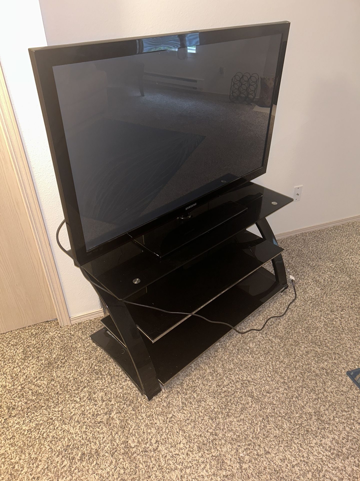 55 Inch TV And Stand (Can Be Purchased Separately)
