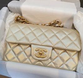 CHANEL Mini Matelasse Gold Lambskin Flap Bag