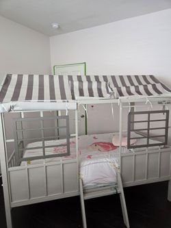 Children's metal playhouse bed frame with canopy