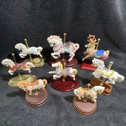 8 Various Porcelain Carousel Horses And A Reindeer 