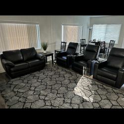 Reclining movie theater style seating and faux leather love seat