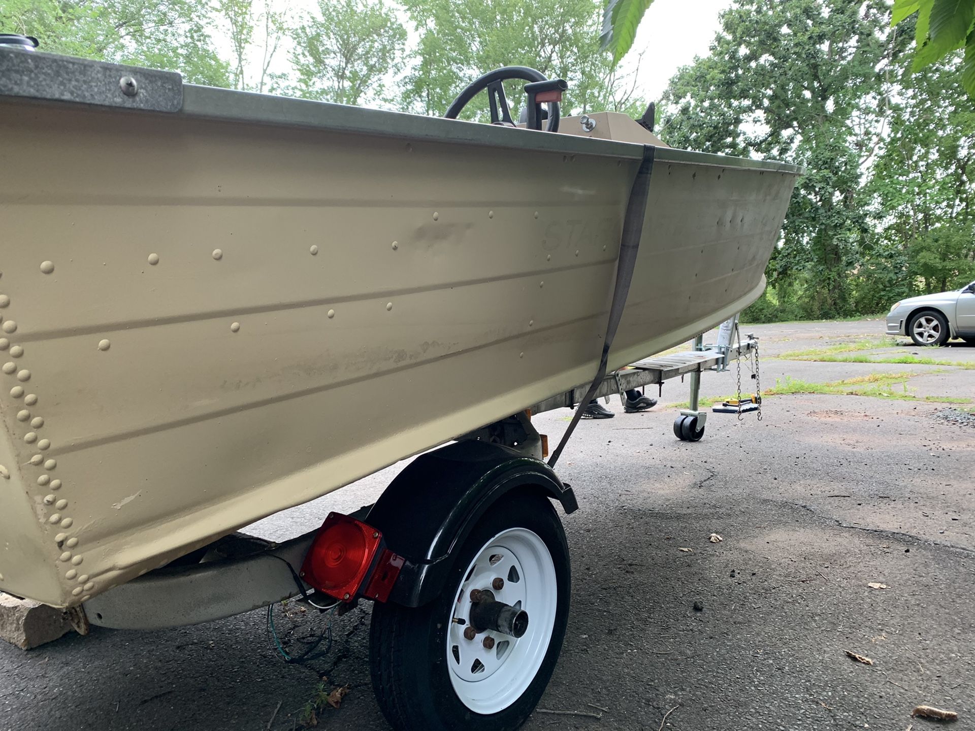 14” aluminum 1986 Starcraft boat 1986 28hp Evinrude and trailer