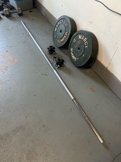 1 inch standard pair of 50lb bumper plates and 7ft straight solid barbell